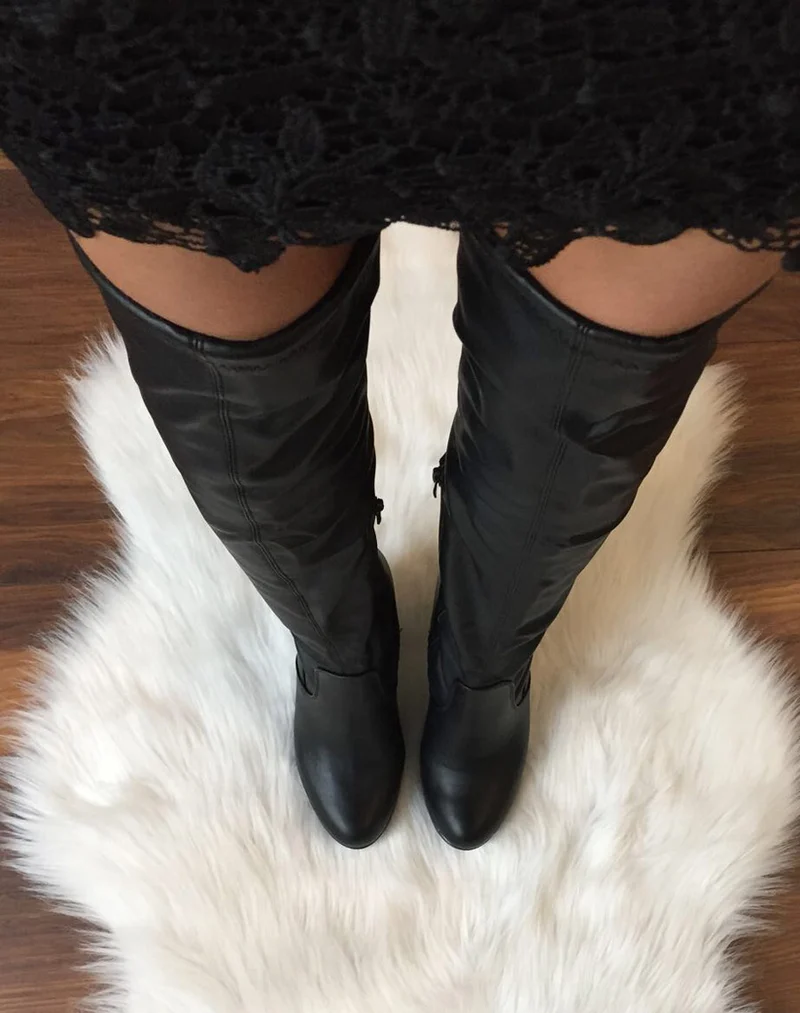 Cuissardes noires à talons hauts