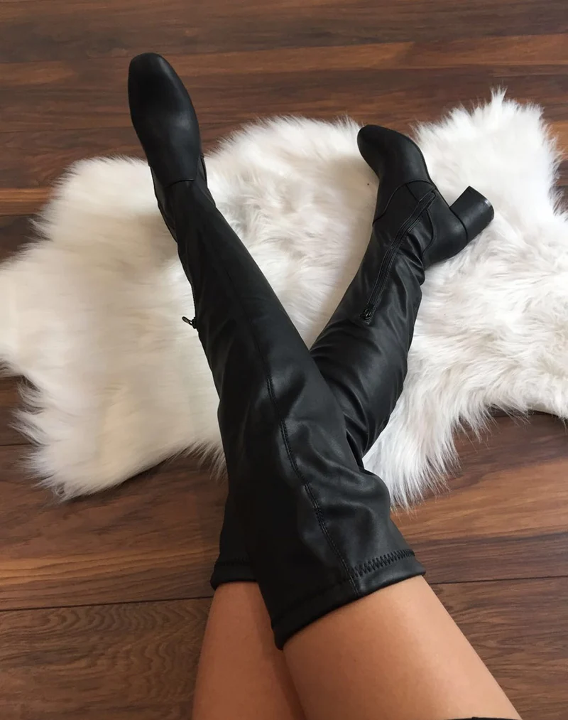 Cuissardes souples noires à talons mi hauts