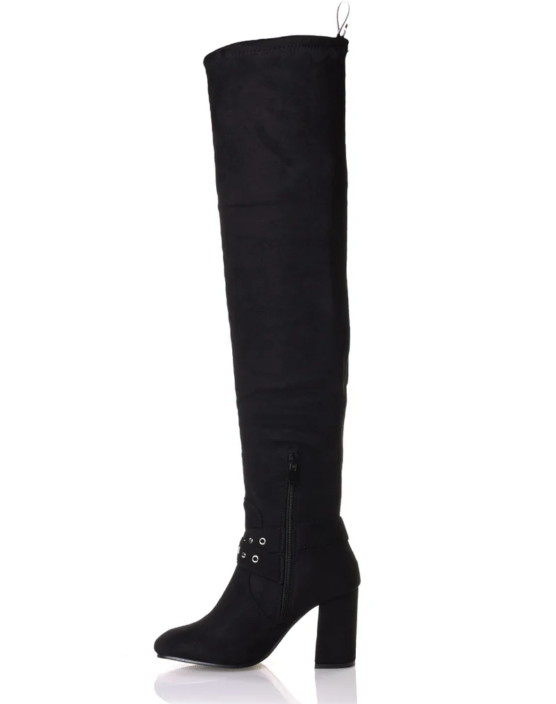 Cuissardes noires en suédine et lanières cloutées