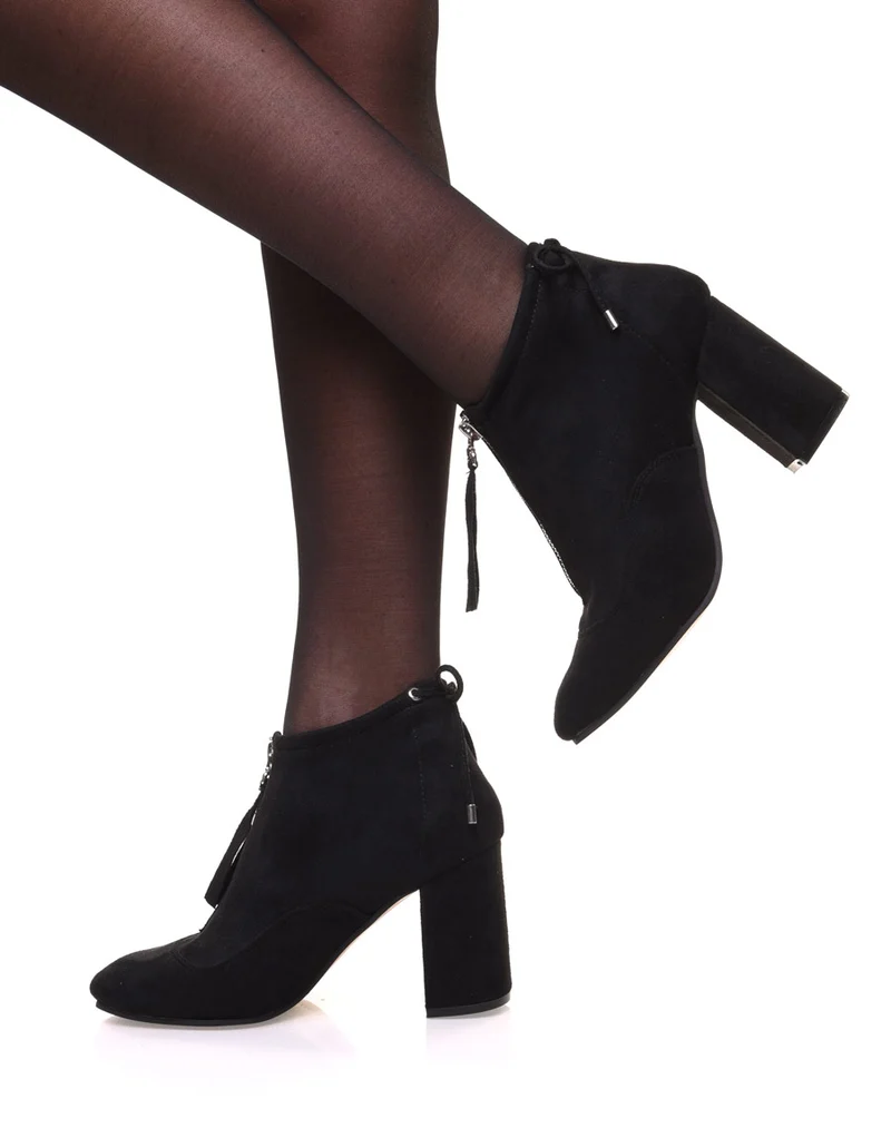 Bottines souples en suédine noires à talons hauts