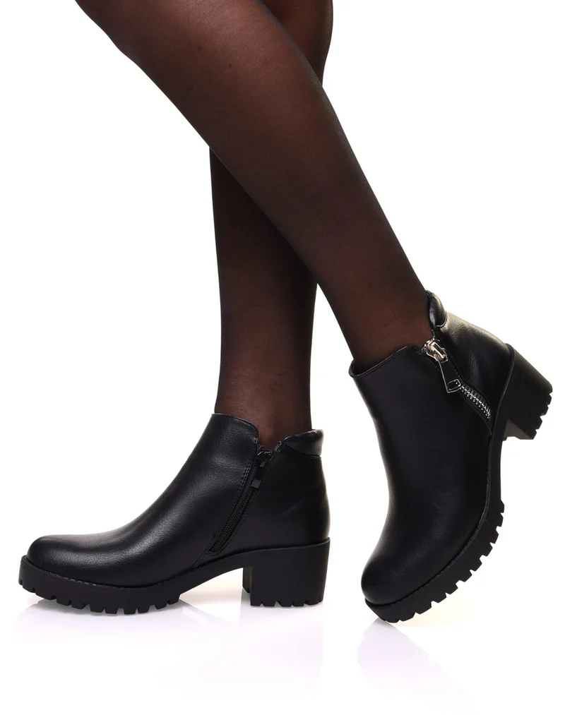 Bottines noires à fermeture éclair décorative et talon mi haut
