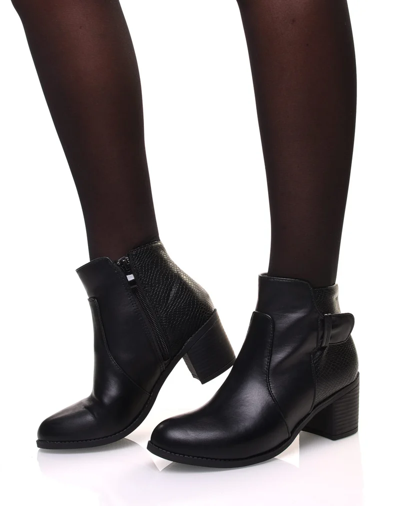 Bottines noires à talon et détails croco