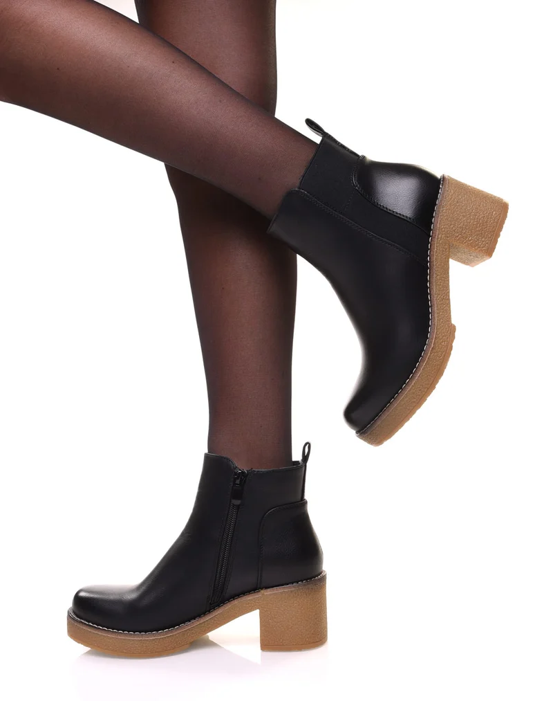 Bottines noires à semelle épaisse contrastée