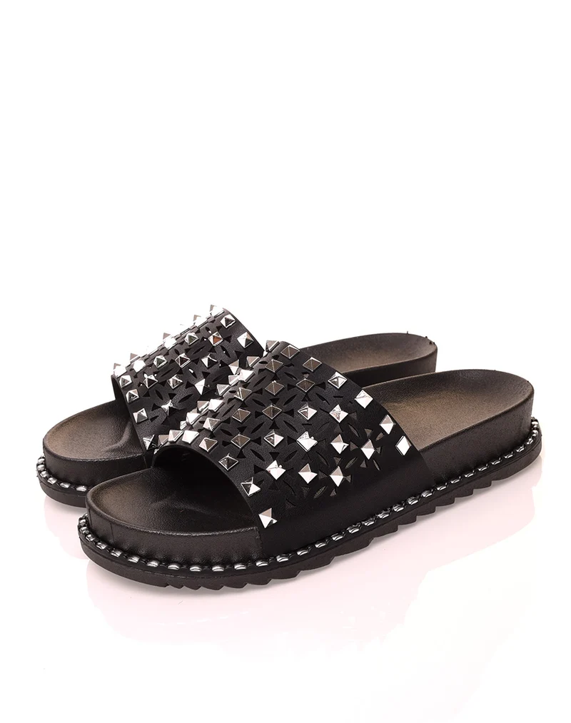 Mules noires cloutées à semelles crantées