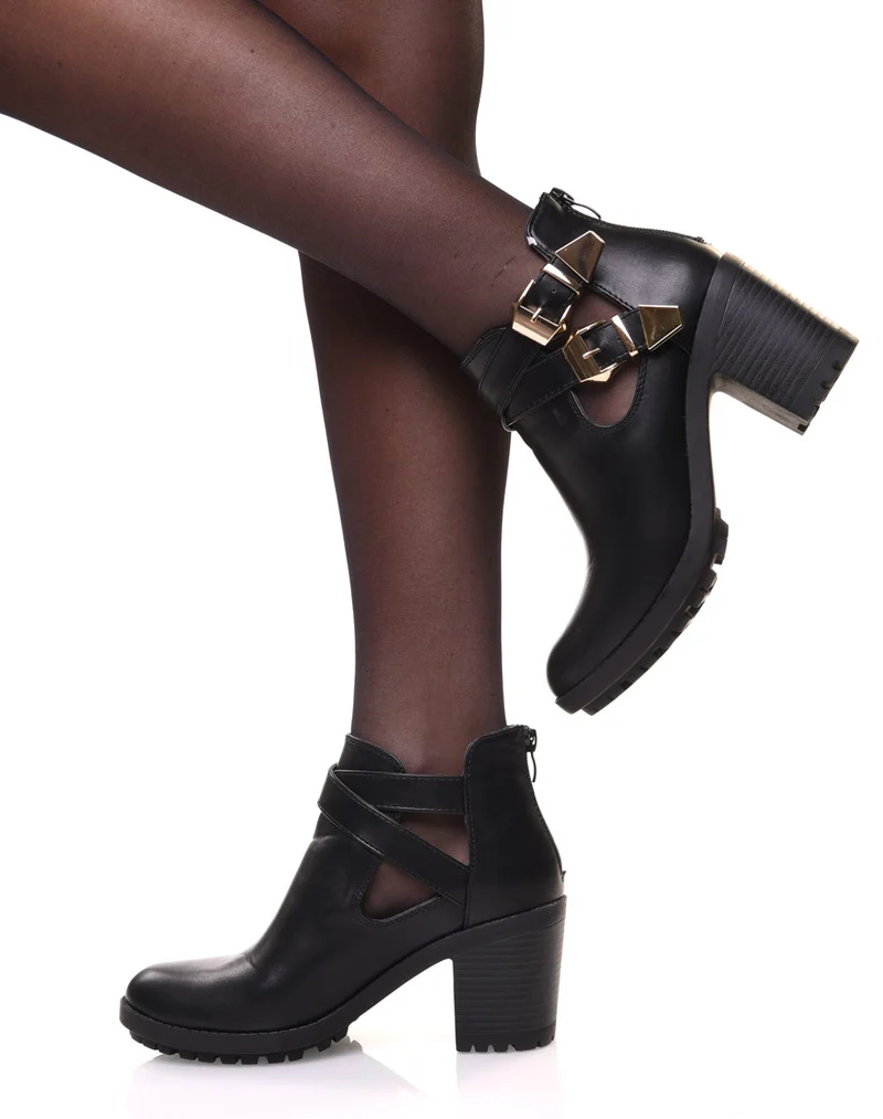 Bottines noires crantées à boucles croisées