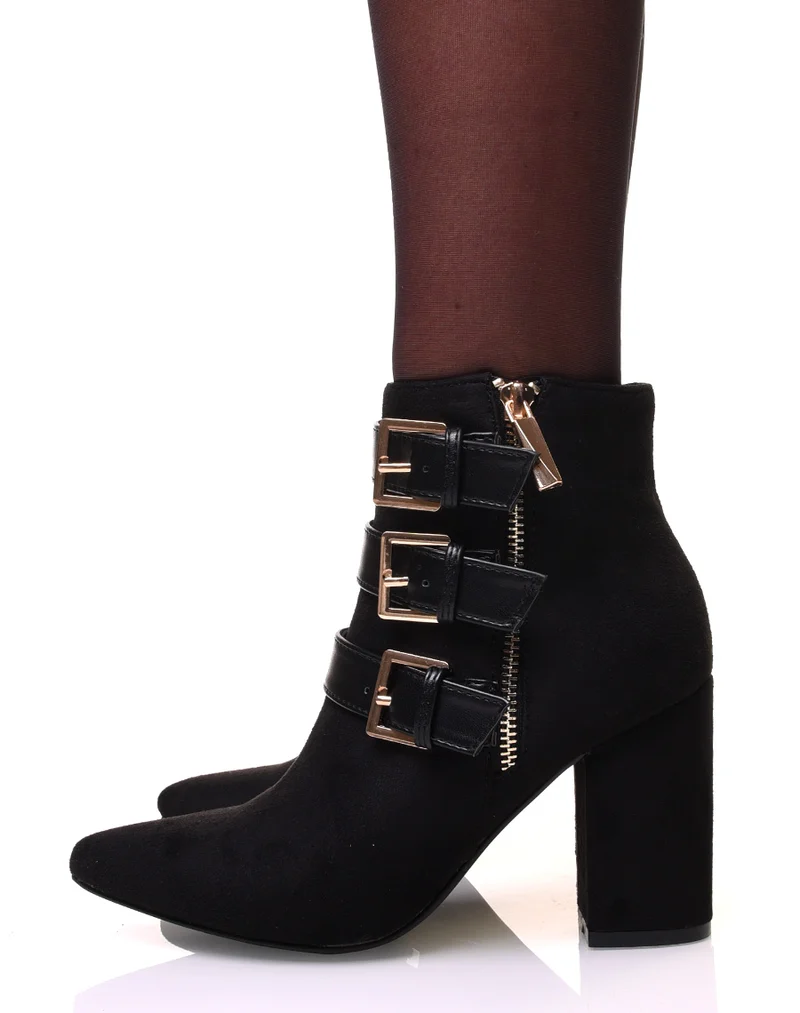 Bottines en suédine à bout pointus et sangles noires