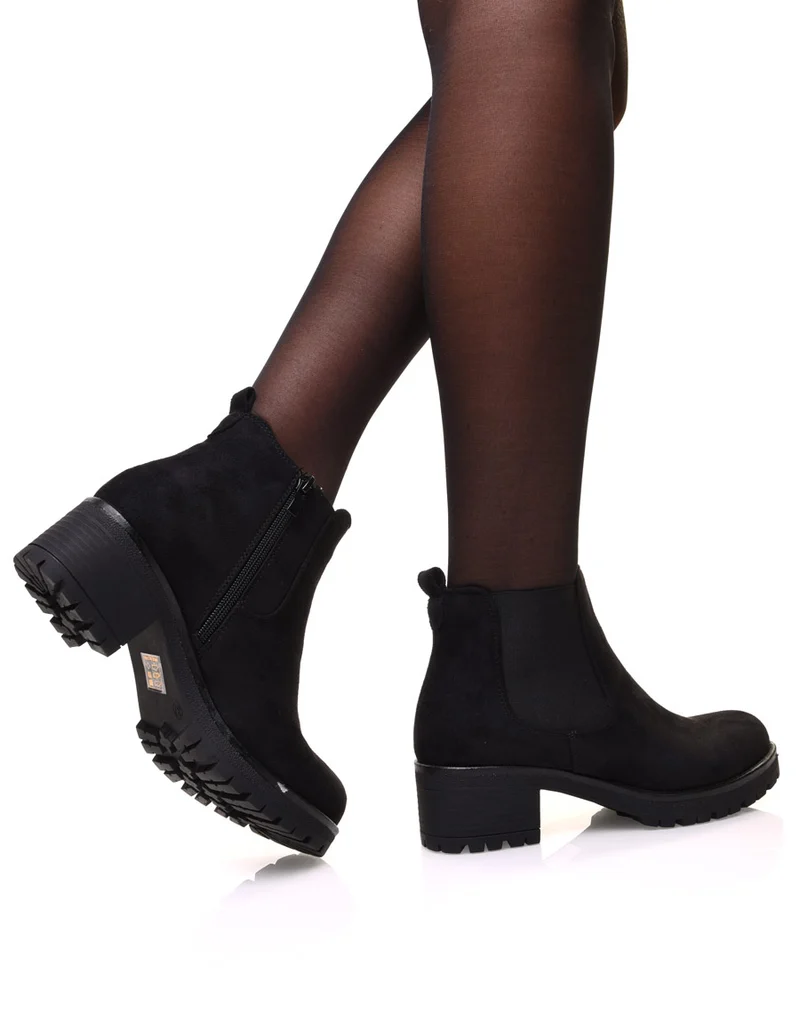 Chelsea boots noires en suédine à talon mi haut