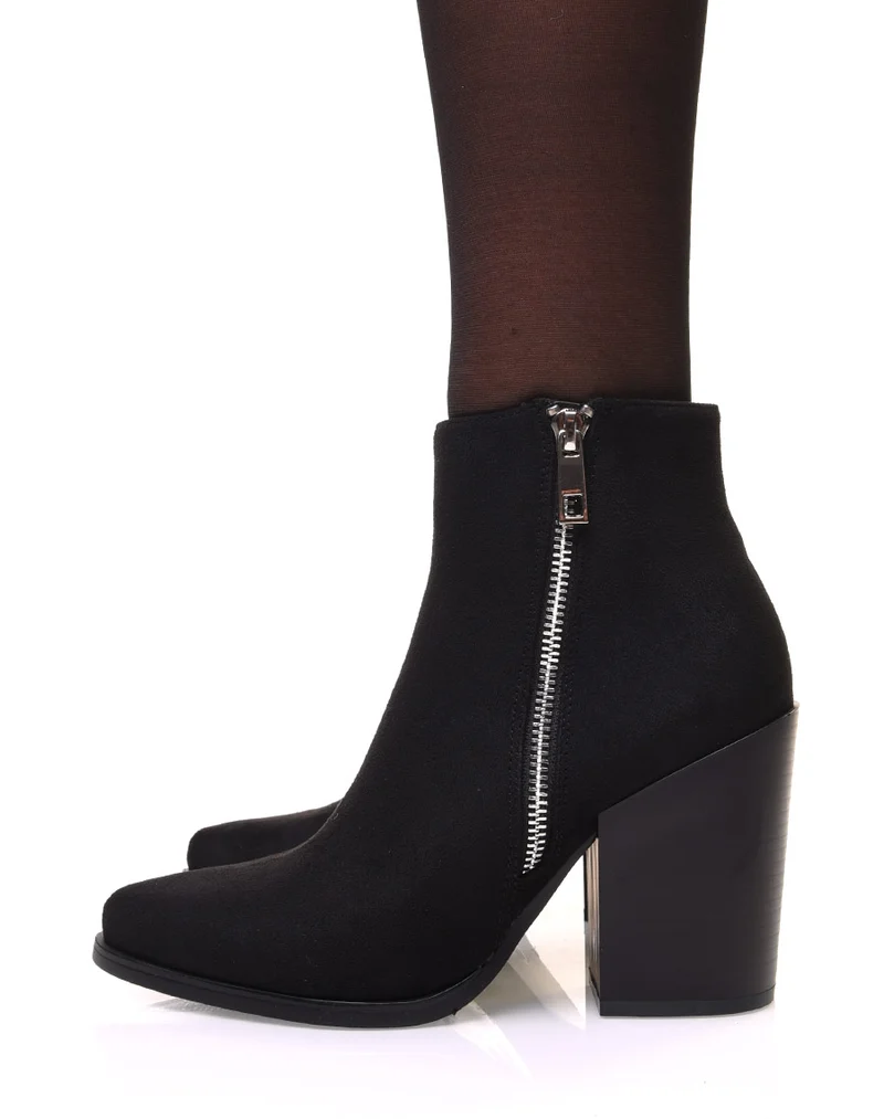 Bottines noires en suédine à bout pointu et talon épais
