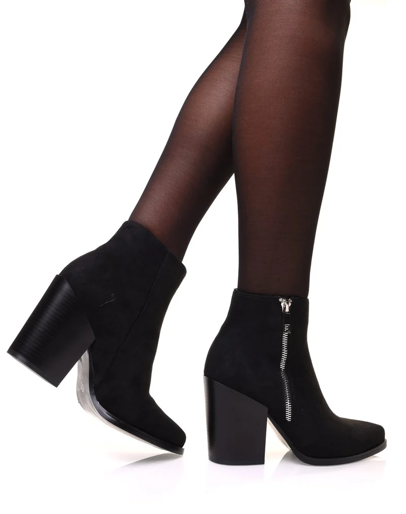 Bottines noires en suédine à bout pointu et talon épais