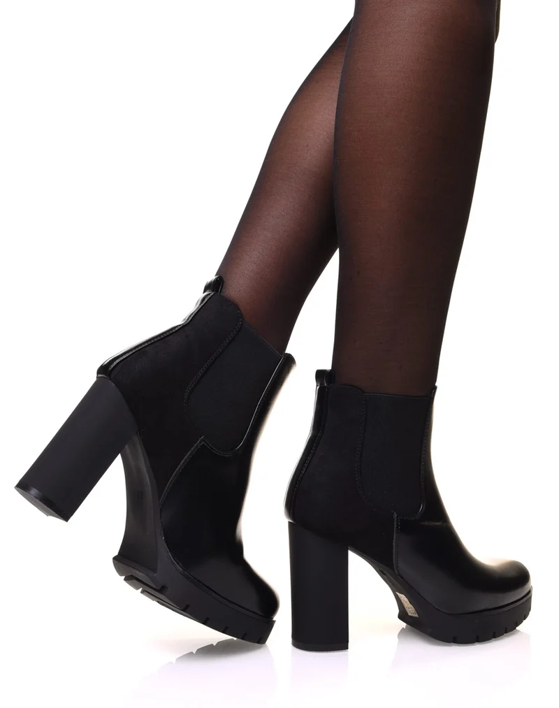 Chelsea boots noires bi matières à talons et plateforme crantée
