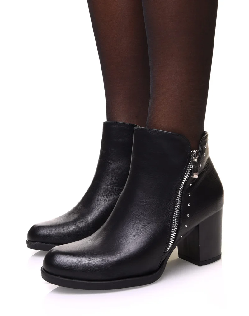Bottines noires à talon mi haut et fermeture décorative