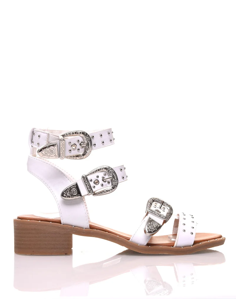 Nu-pieds blancs à boucles ornées