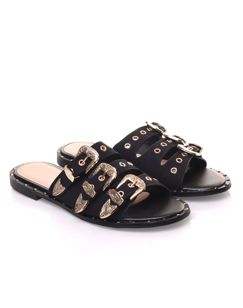Mules noires avec boucles dorées