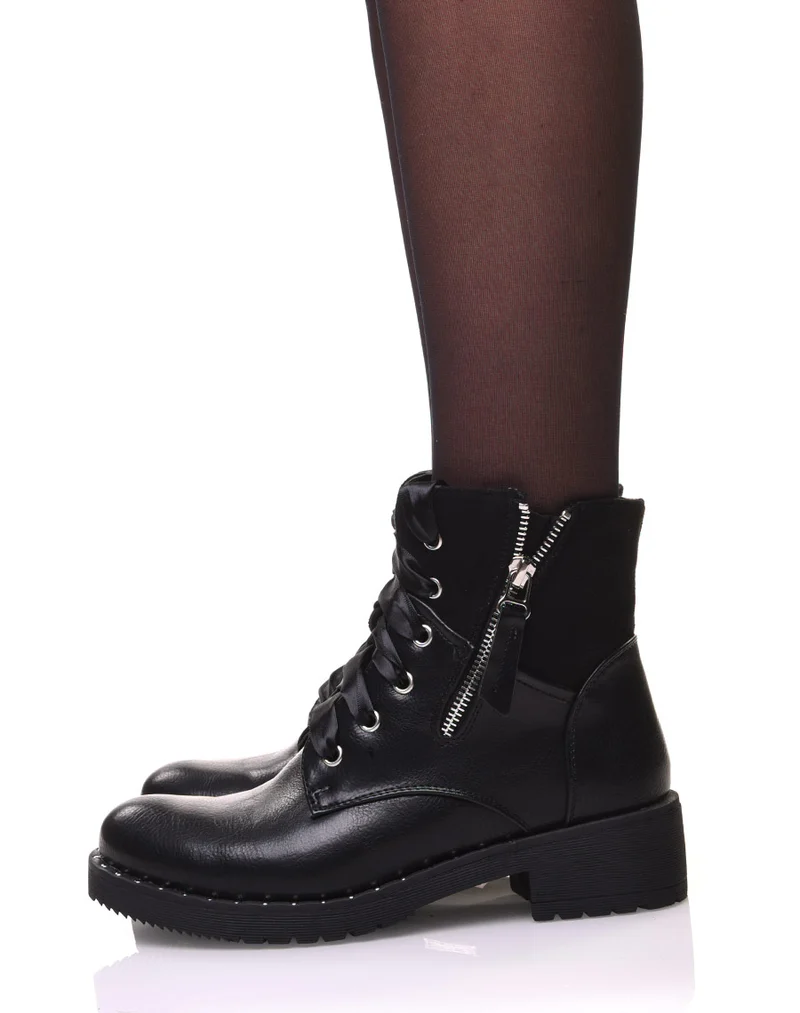 Bottines noires à lacets et semelles cloutées