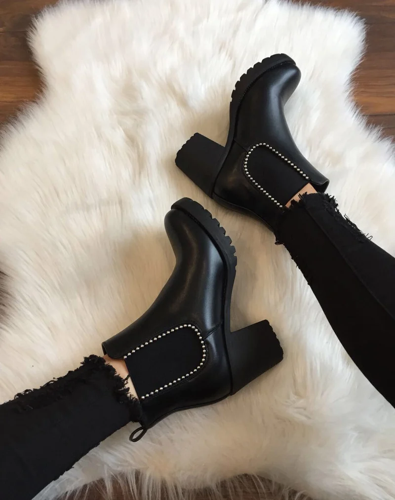 Bottines cloutées noires à talons