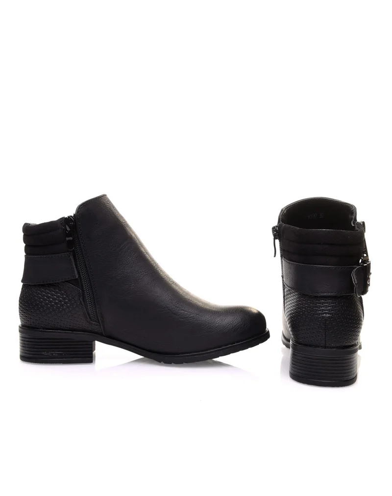 Bottines noires à talons et fermetures zippées