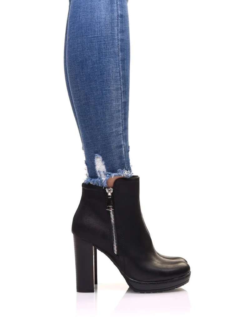 Bottines à talons bi matières noires