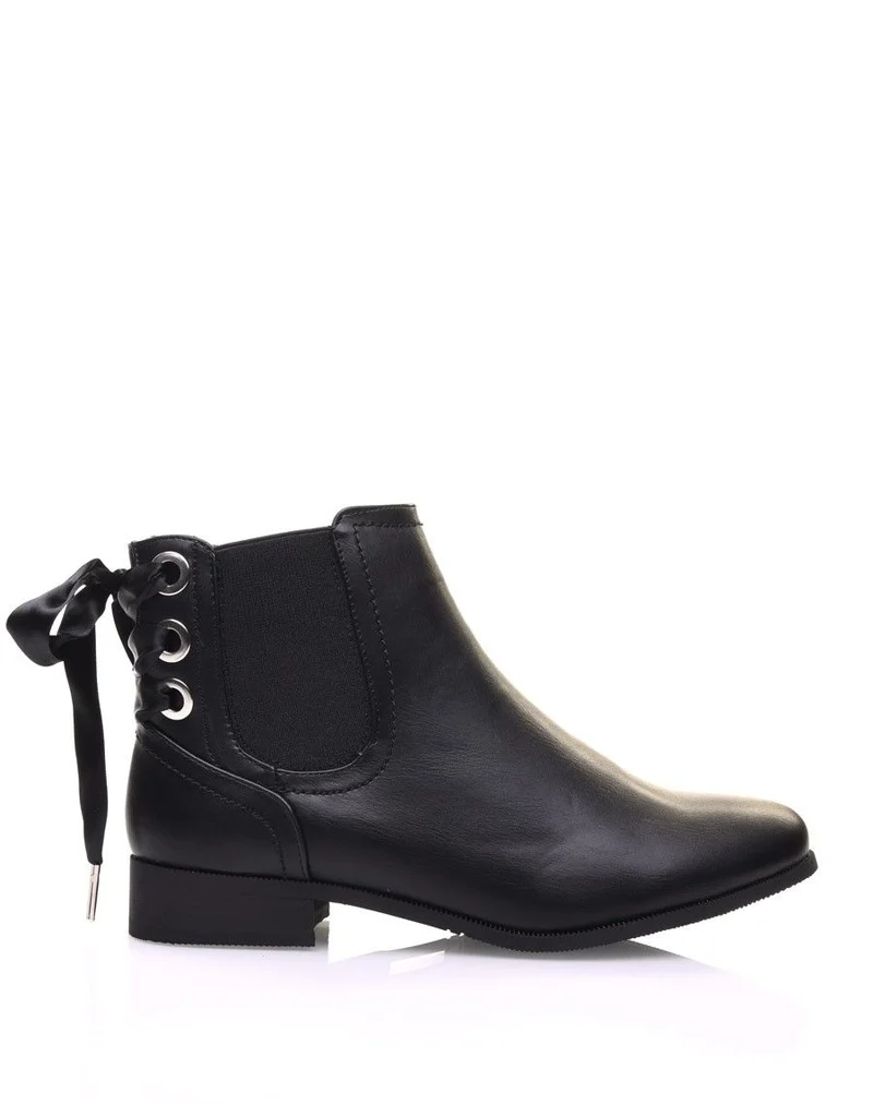 Chelsea boots noires à oeillets et noeud