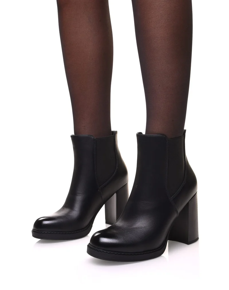 Bottines noires semi-montantes élastiques