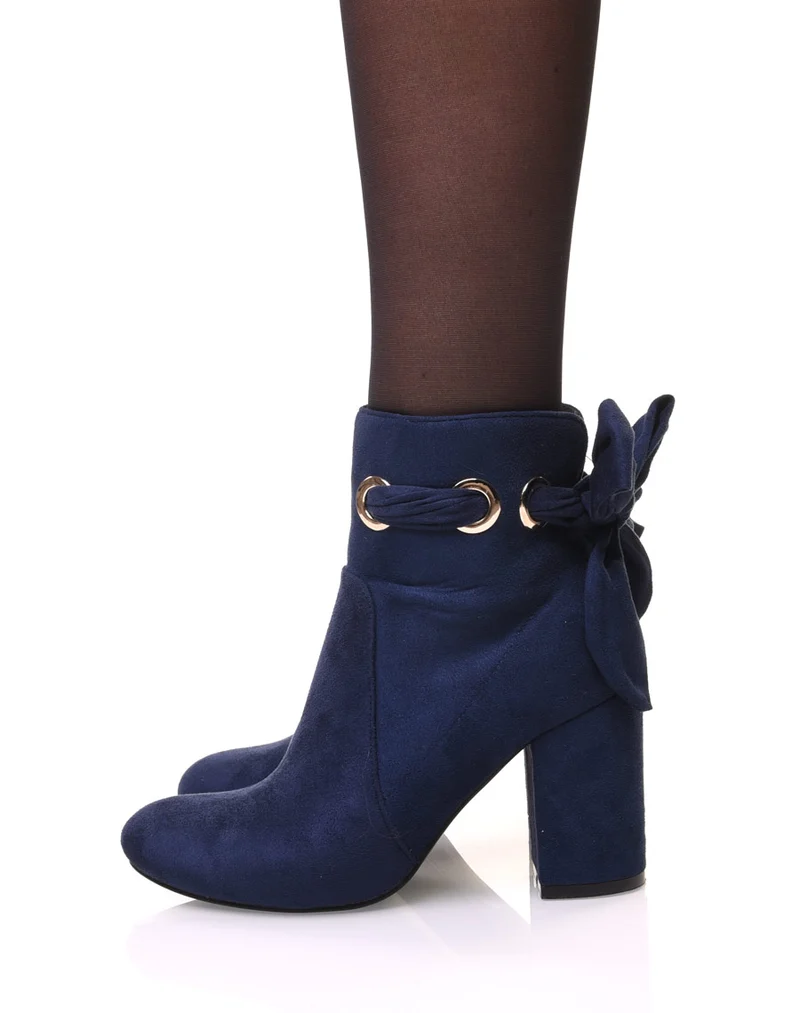 Bottines bleues à noeud et oeillets dorés