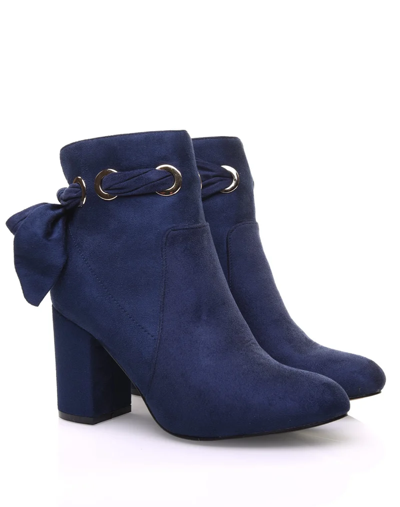 Bottines bleues à noeud et oeillets dorés