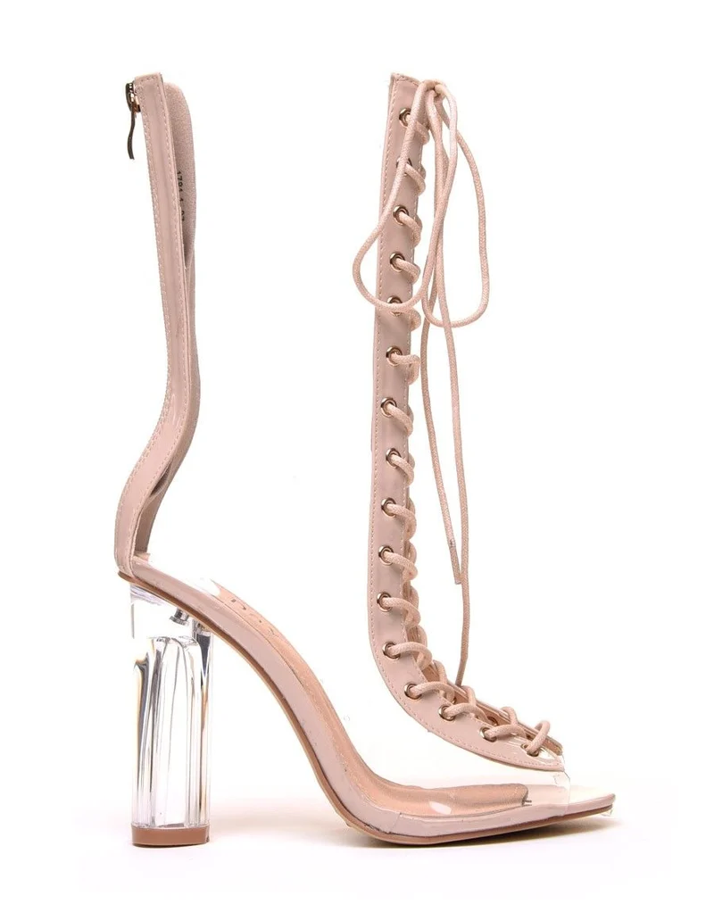 Bottes hautes nudes à talons transparents
