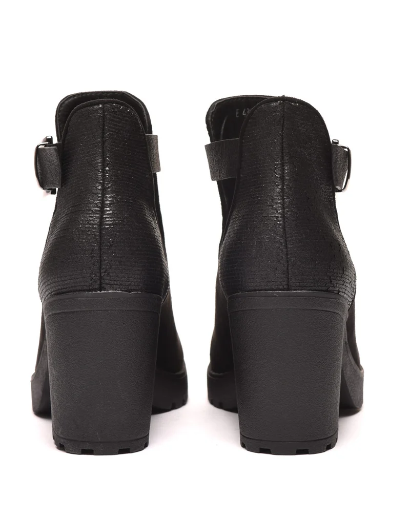 Bottines ajourées noires avec sangle à boucle