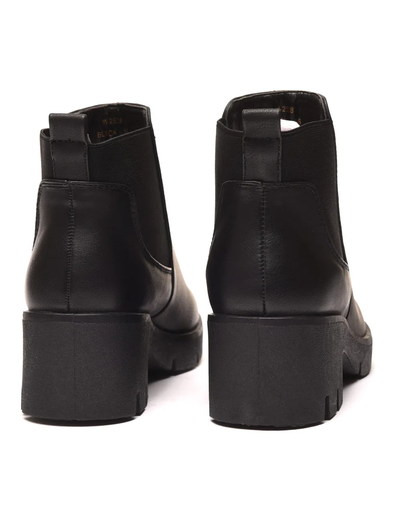 Bottines noires avec élastiques & grosse semelle crantée