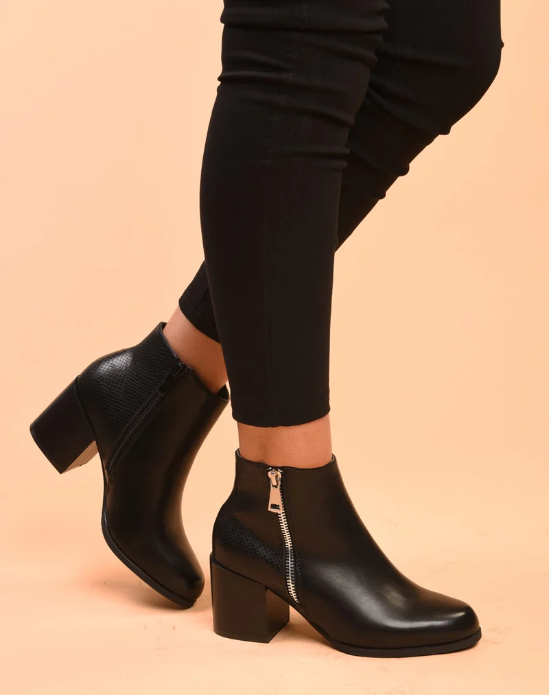 Bottines à talons noires avec fermeture & motifs python