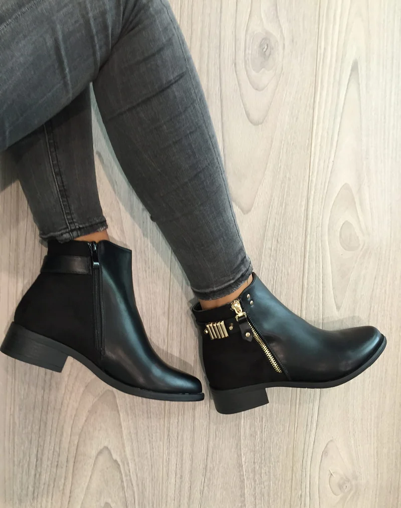 Bottines noires plates bi matières avec détails à l'arrière