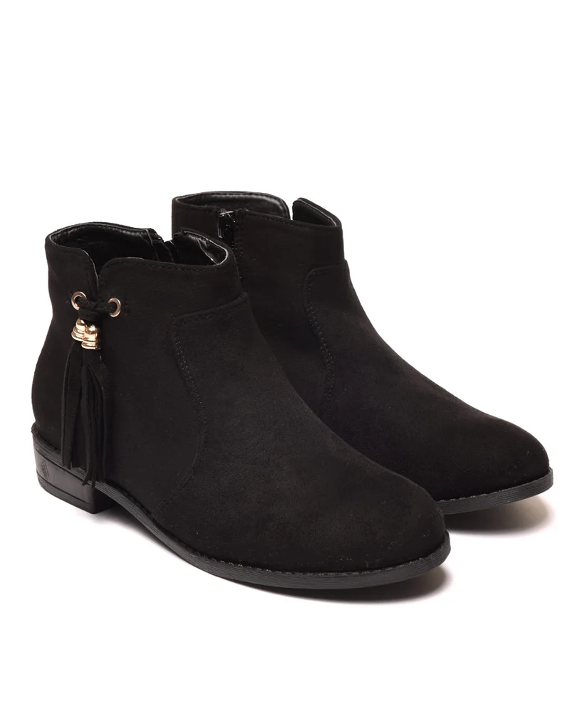 Bottines plates noires avec pompons à franges