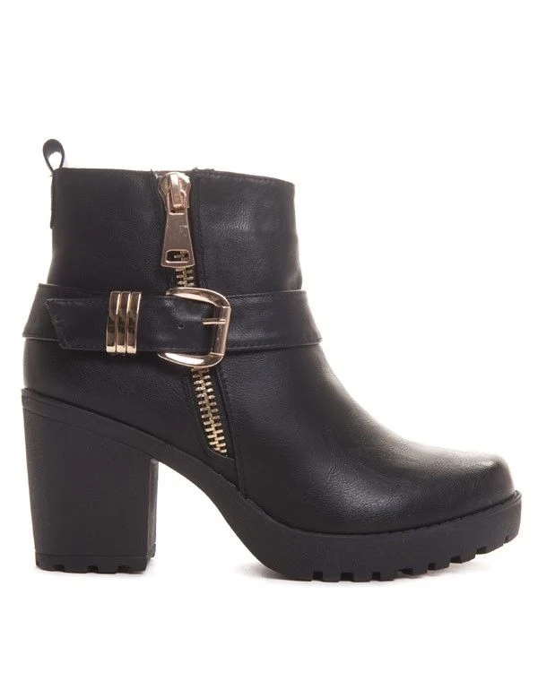 Bottines à talon et semelle crantée noire