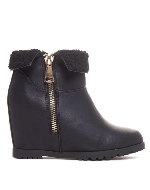 Boots noires compensées et fourrées