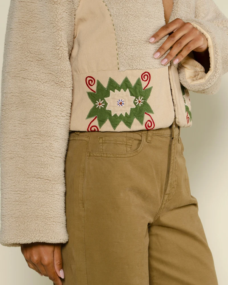 Blouson bouclette v de vinster